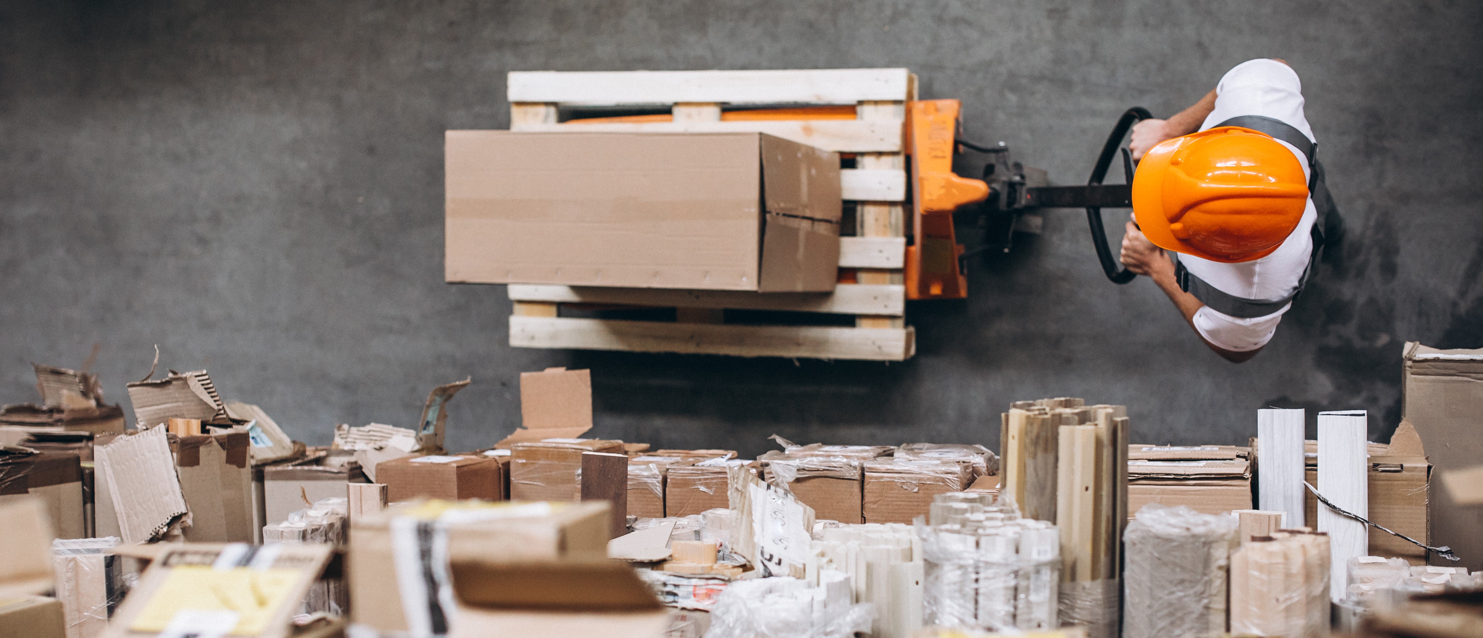 young-man-working-warehouse-with-boxes.jpg